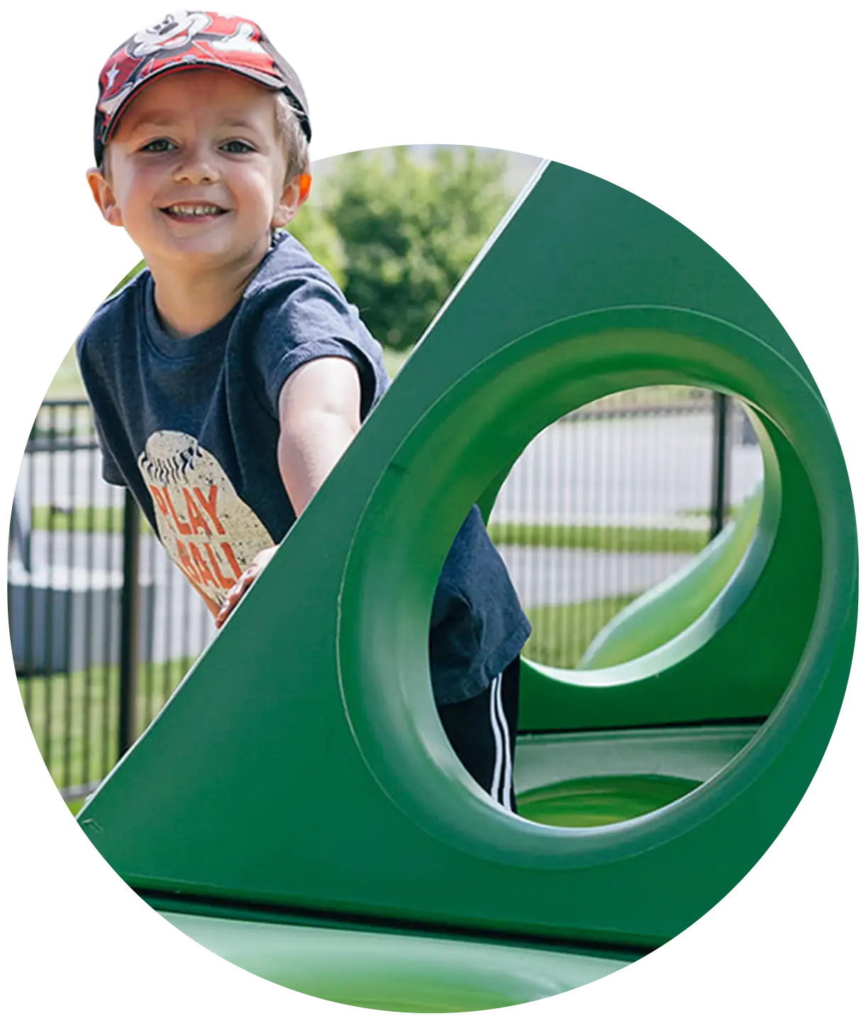 A smiling boy on the VRL playground